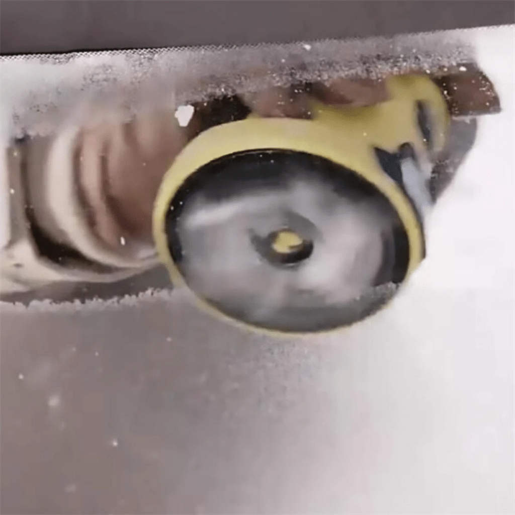 Heated Windshield Scraper With Automatic Clearing For Winter Driving