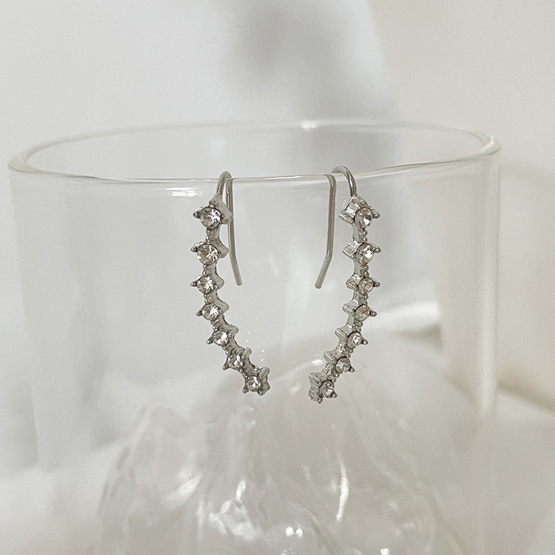 Lunara syv stjerners diamantøredobber