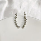 Lunara syv stjerners diamantøredobber