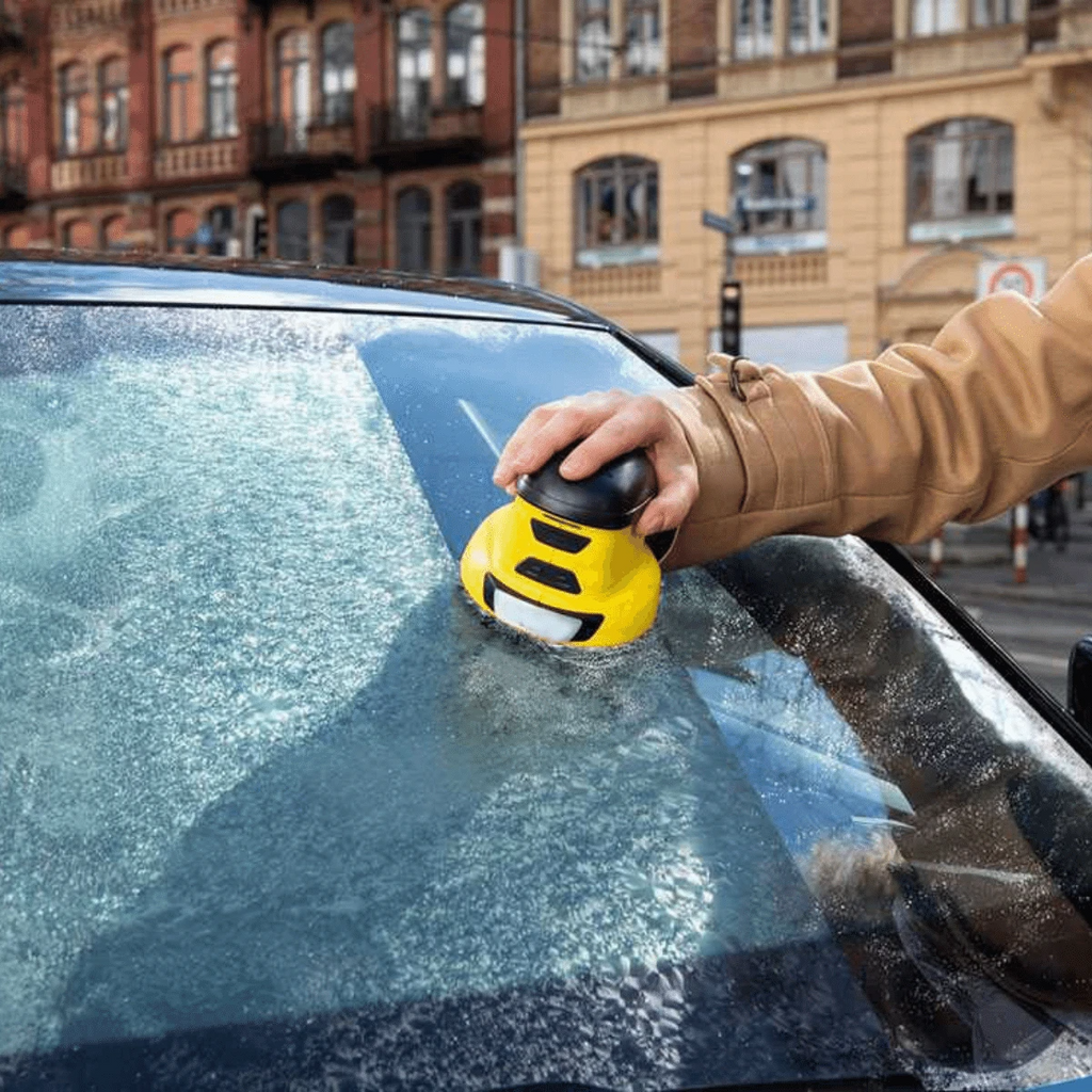Heated Windshield Scraper With Automatic Clearing For Winter Driving