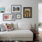 CelesteLume Alabaster LED Disc Sconce with Black Arm