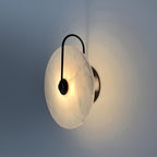 CelesteLume Alabaster LED Disc Sconce with Black Arm