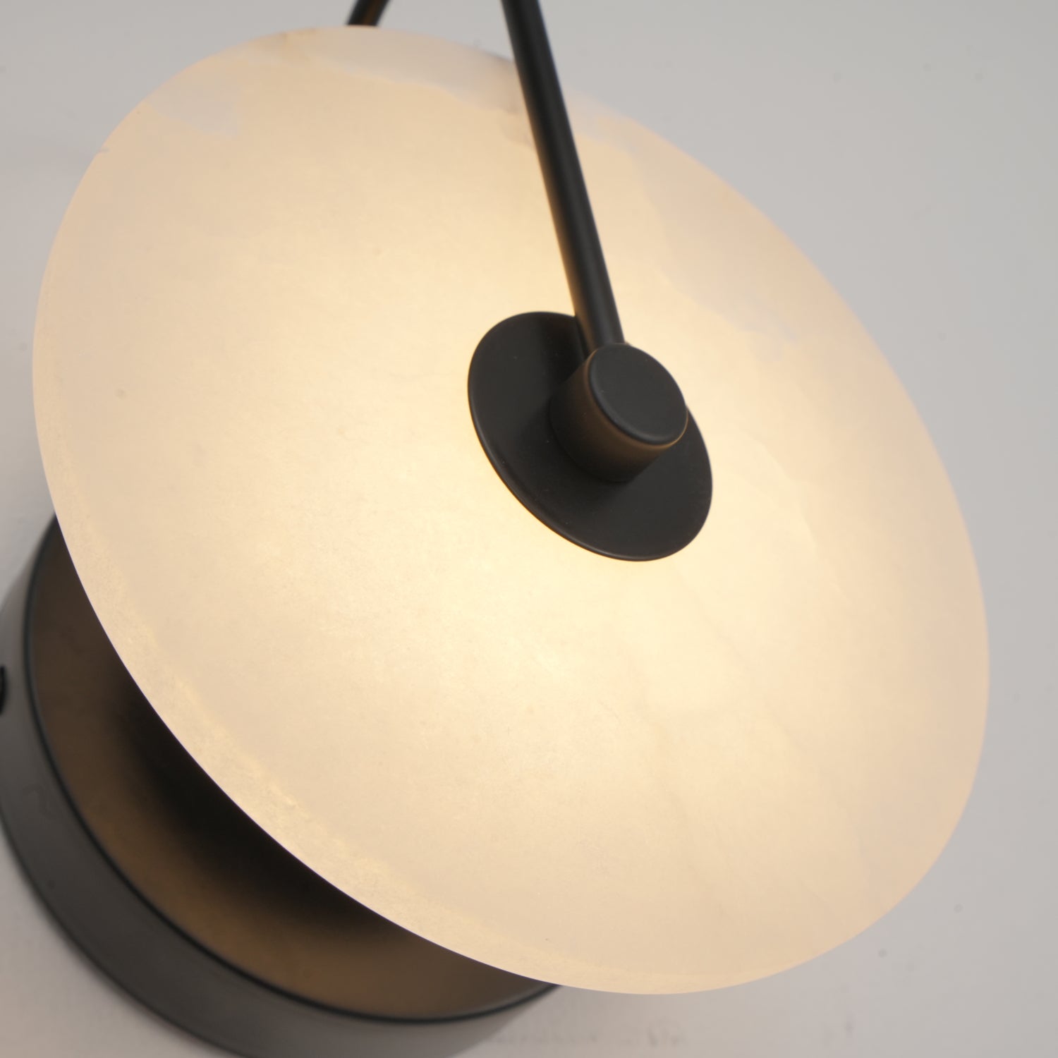 CelesteLume Alabaster LED Disc Sconce with Black Arm