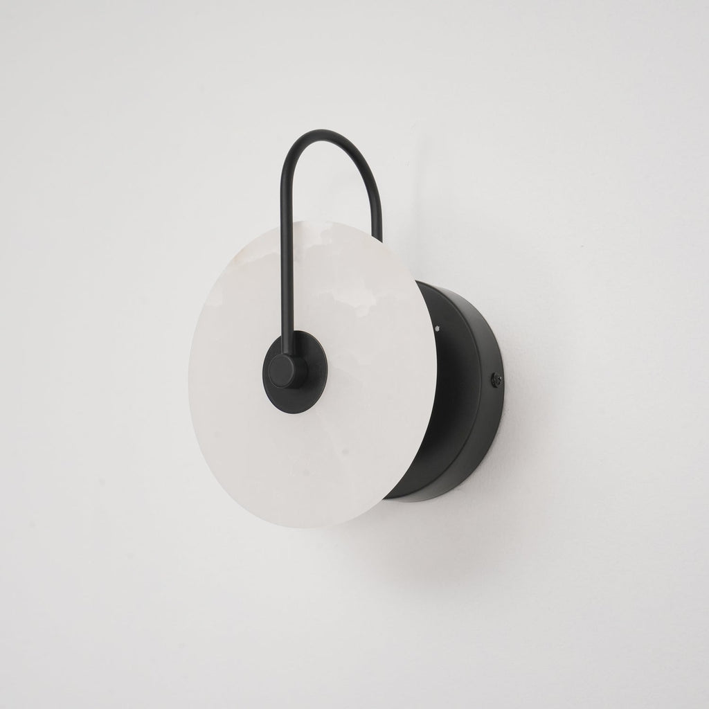 CelesteLume Alabaster LED Disc Sconce with Black Arm