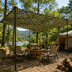 Camouflage net with realistic leaf design for outdoor use
