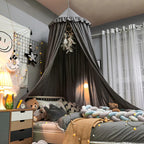 LumaNest gyerekágy baldachin bojttal fehér, rózsaszín, szürke színben