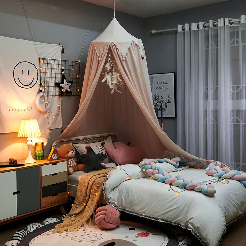 LumaNest gyerekágy baldachin bojttal fehér, rózsaszín, szürke színben