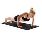 Kompakt yogamatta med bärrem och halkfri yta för komfort och rörlighet