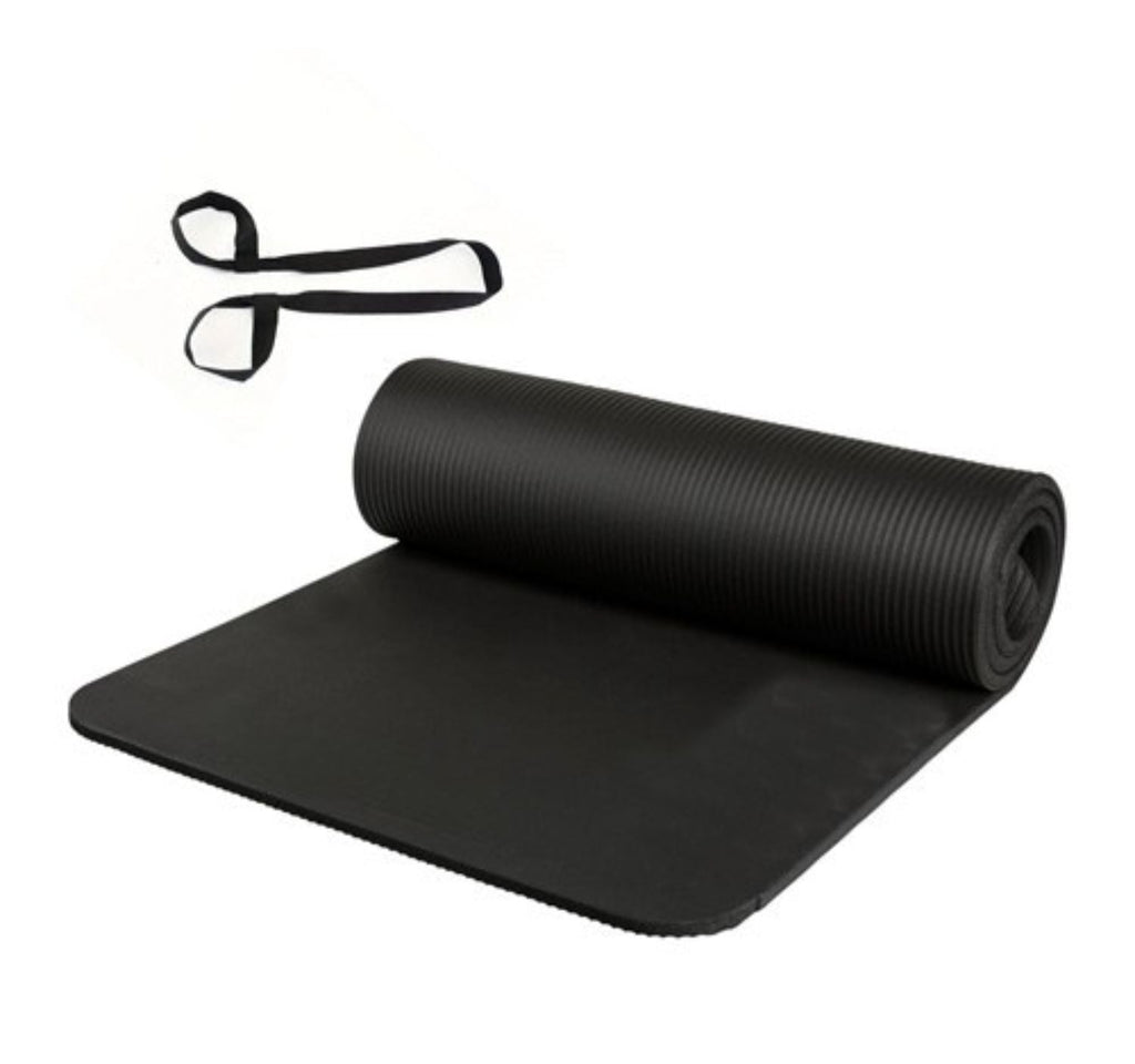 Kompakt yogamatta med bärrem och halkfri yta för komfort och rörlighet