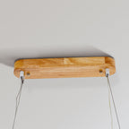 LumaWood LED Pendant Light With Wood Finish And Subtle Metal Accents