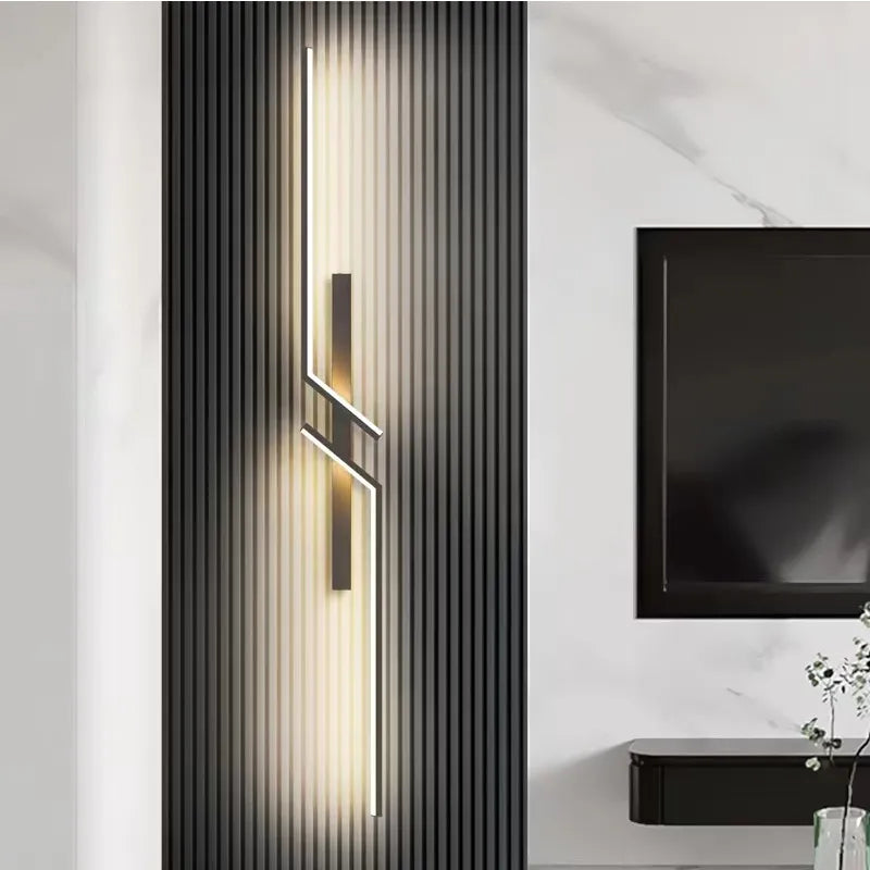 Lampa ścienna Mensah z odważnym nowoczesnym designem do przestrzeni mieszkalnych