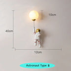 Lámpara de pared para habitación infantil estilo astronauta