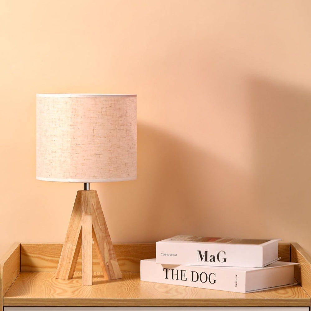 The Minimalist Table Lamp With An Elegant Tripod Stand