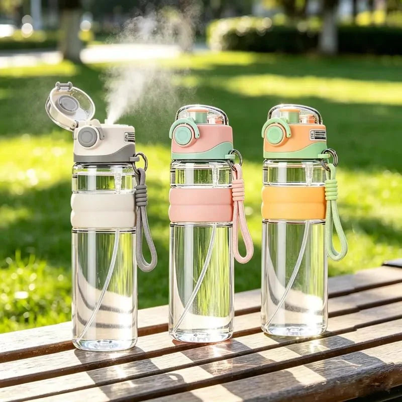 Leak-proof water bottle with mist spray for outdoor adventures