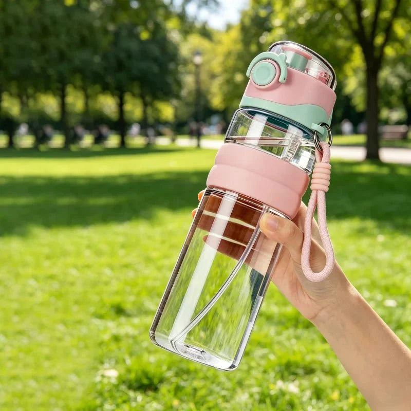 Leak-proof water bottle with mist spray for outdoor adventures