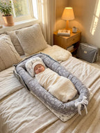 Cocon Nomade Baby Bed Reducer With Padded Cocoon And Carry Bag
