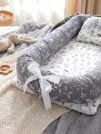 Cocon Nomade Baby Bed Reducer With Padded Cocoon And Carry Bag