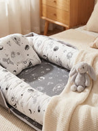 Cocon Nomade Baby Bed Reducer With Padded Cocoon And Carry Bag