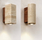 Vegglampe i svart travertin