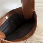 נורלי | תיק יד מעור