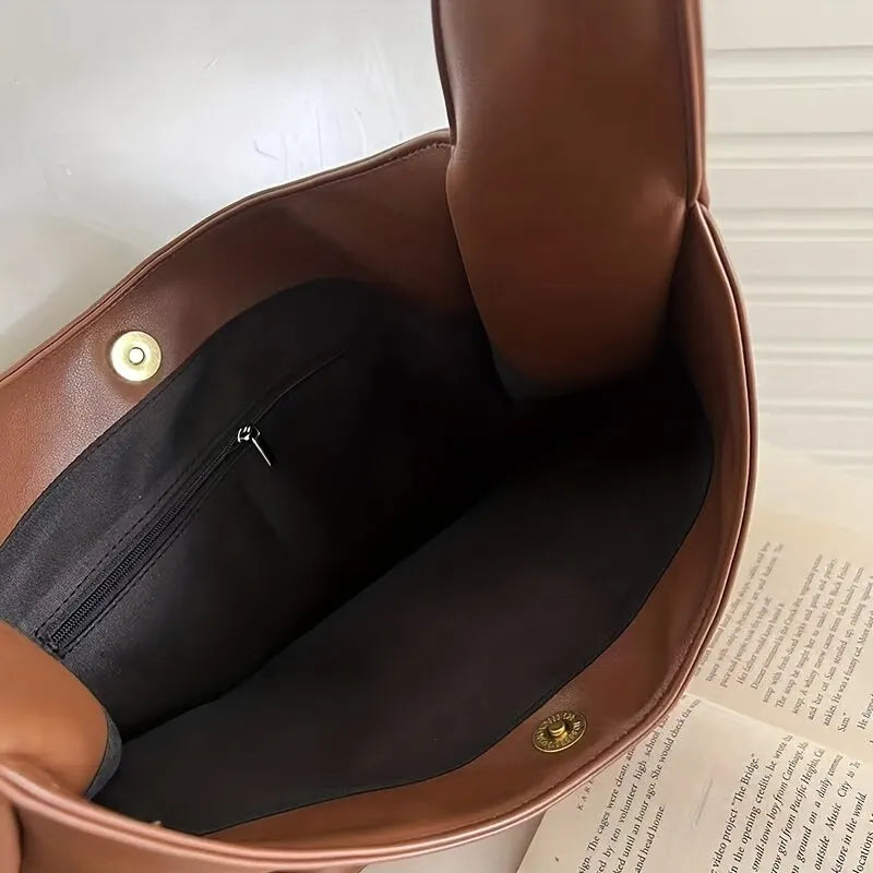 נורלי | תיק יד מעור