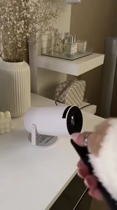 جهاز عرض ذكي | حوّل أي مساحة إلى سينما منزلية | جهاز عرض ذكي صغير محمول مع تطبيقات بث مدمجة
