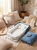 Cocon Nomade Baby Bed Reducer With Padded Cocoon And Carry Bag