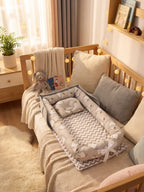 Cocon Nomade Baby Bed Reducer With Padded Cocoon And Carry Bag