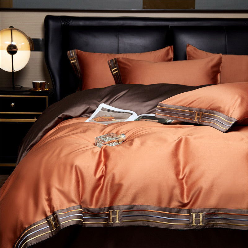 Set di biancheria da letto in cotone satinato ricamato Luminoir, quattro pezzi per camere da letto eleganti