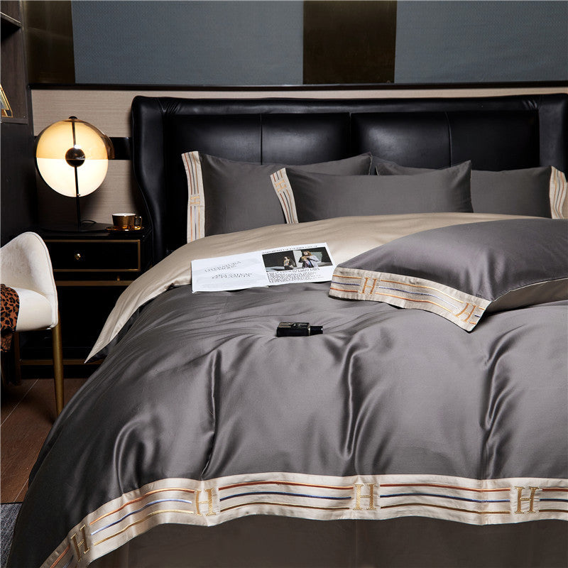 Set di biancheria da letto in cotone satinato ricamato Luminoir, quattro pezzi per camere da letto eleganti