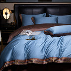 Set di biancheria da letto in cotone satinato ricamato Luminoir, quattro pezzi per camere da letto eleganti