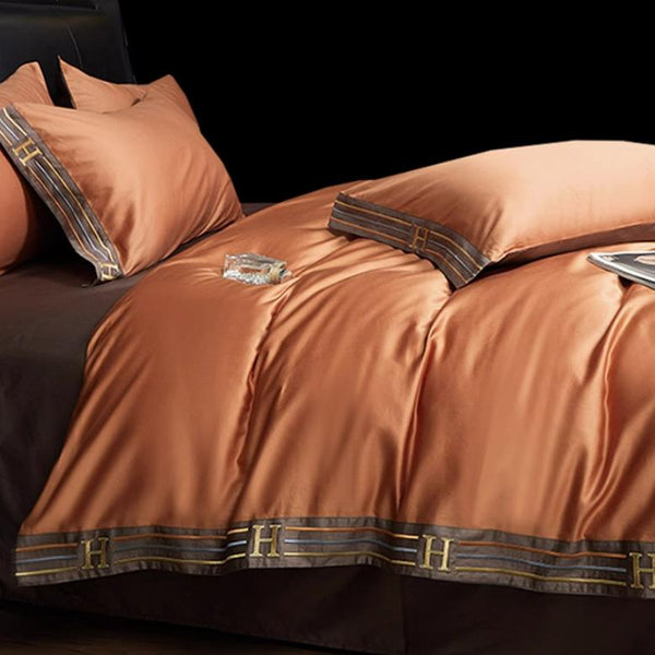 Set di biancheria da letto in cotone satinato ricamato Luminoir, quattro pezzi per camere da letto eleganti