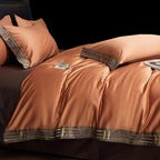 Set di biancheria da letto in cotone satinato ricamato Luminoir, quattro pezzi per camere da letto eleganti