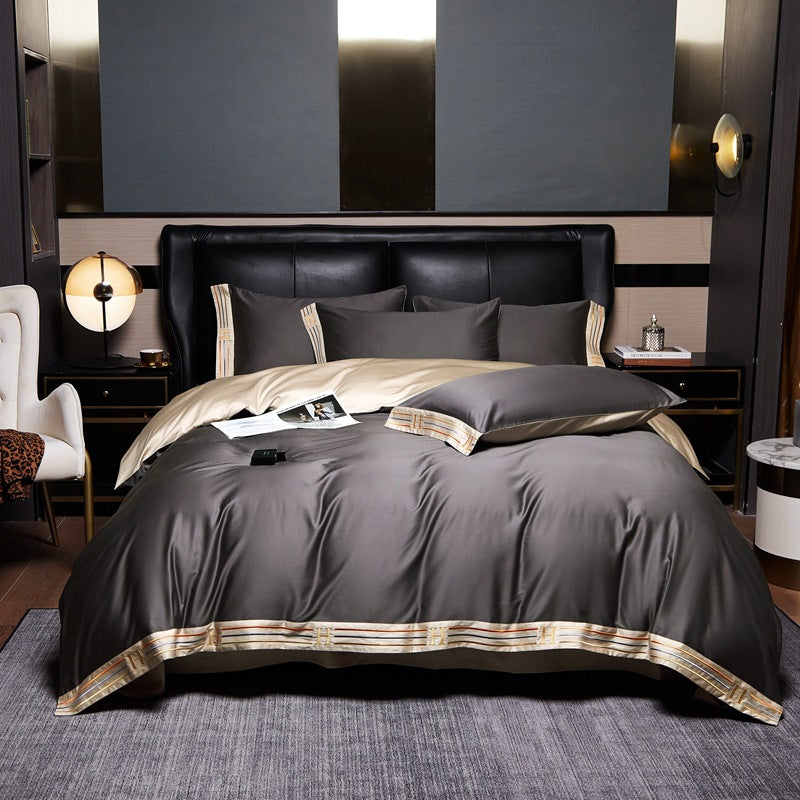 Set di biancheria da letto in cotone satinato ricamato Luminoir, quattro pezzi per camere da letto eleganti